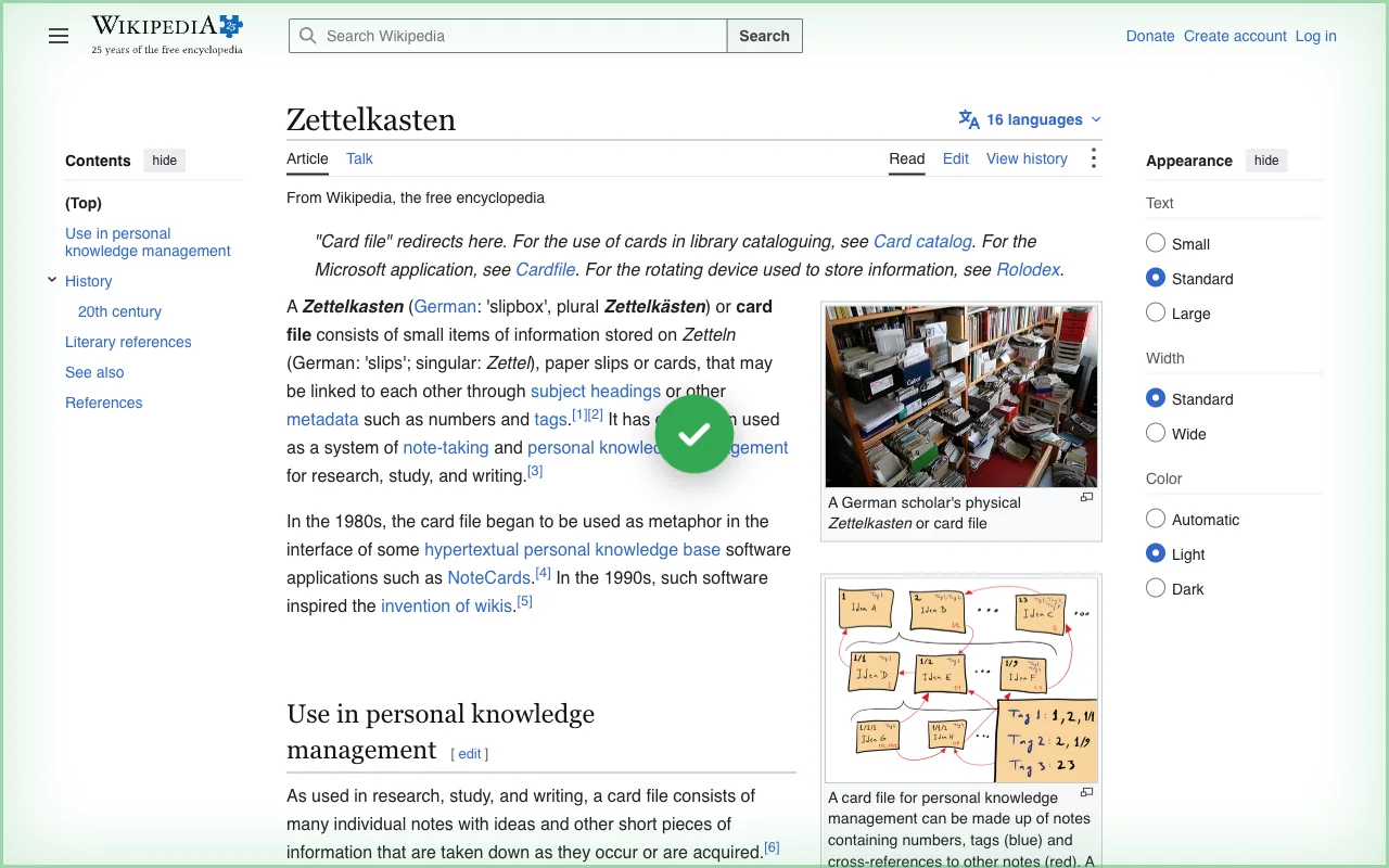 A web page right after a tab was stashed: a green glow at the edges and a check mark